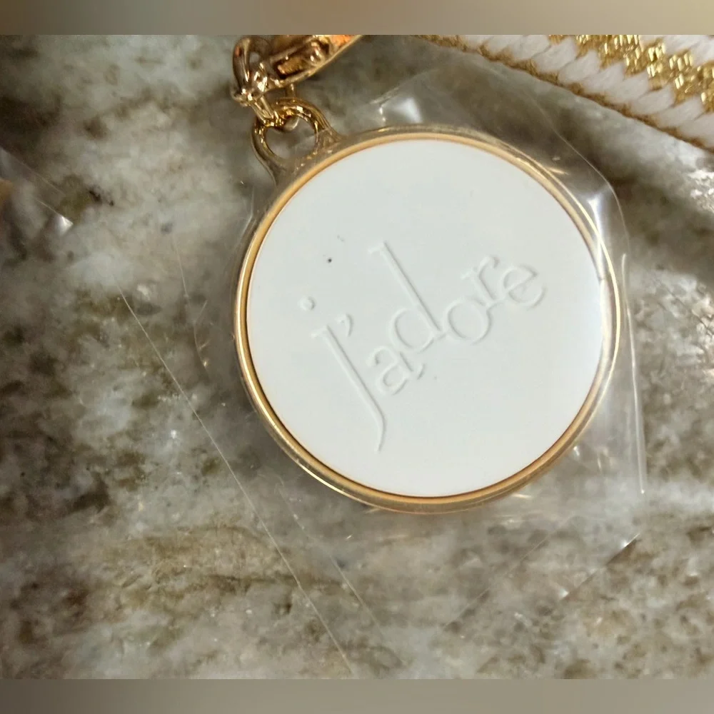 Dior J’adore Phone Strap with Charms. Measures 22” long. New in Box. Sealed